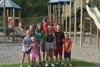 residents in front of playground
